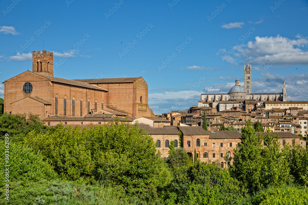 View of the historic Centre of Siena. Old Town of Siena with Basilica of San Domenico, Basilica Cateriniana, and Cathedral of Siena, Duomo di Siena, Tuscany, Italy