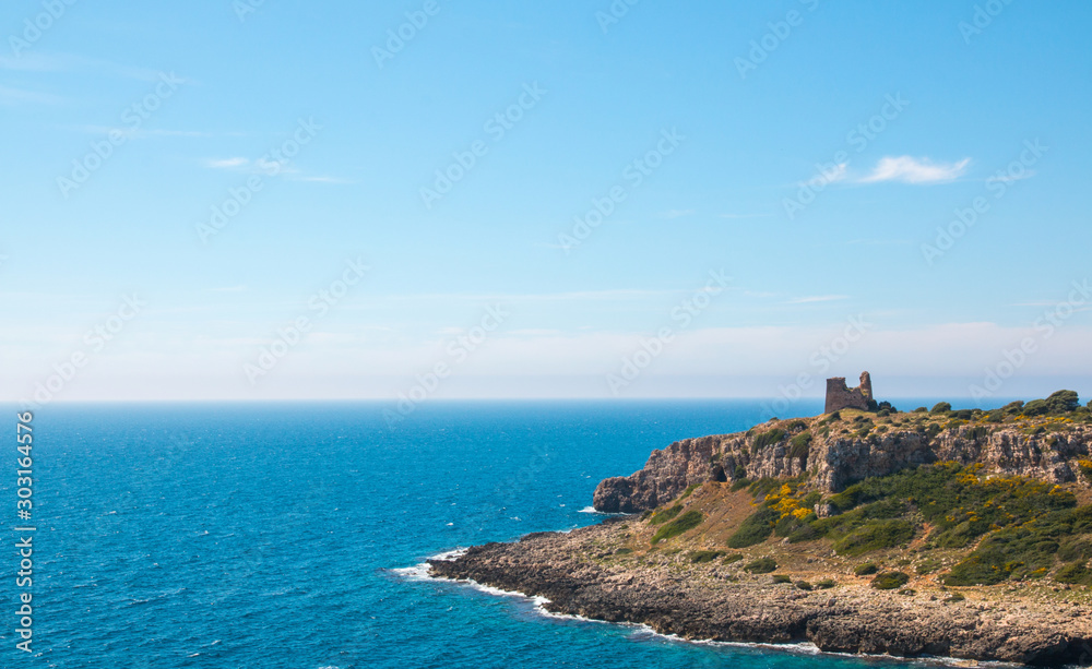 Watchtower near ionian sea (Uluzzo tower in Porto Selvaggio) Apulia, Salento, Italy