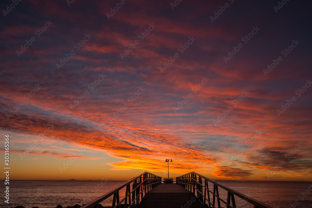  Image of pier over the Mediterranean sea at sunrise