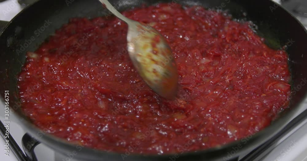 Saucepan with a homemade appetizing and tasty borsch. Red beetroot vegetable soup, boiling in pot. Ukrainian and russian traditional red beet soup - borscht or borsch