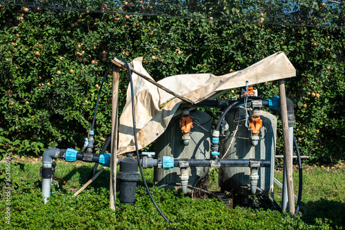 Liquid fertilizer tanks for apple orchard fertilizing. © Deyan Georgiev