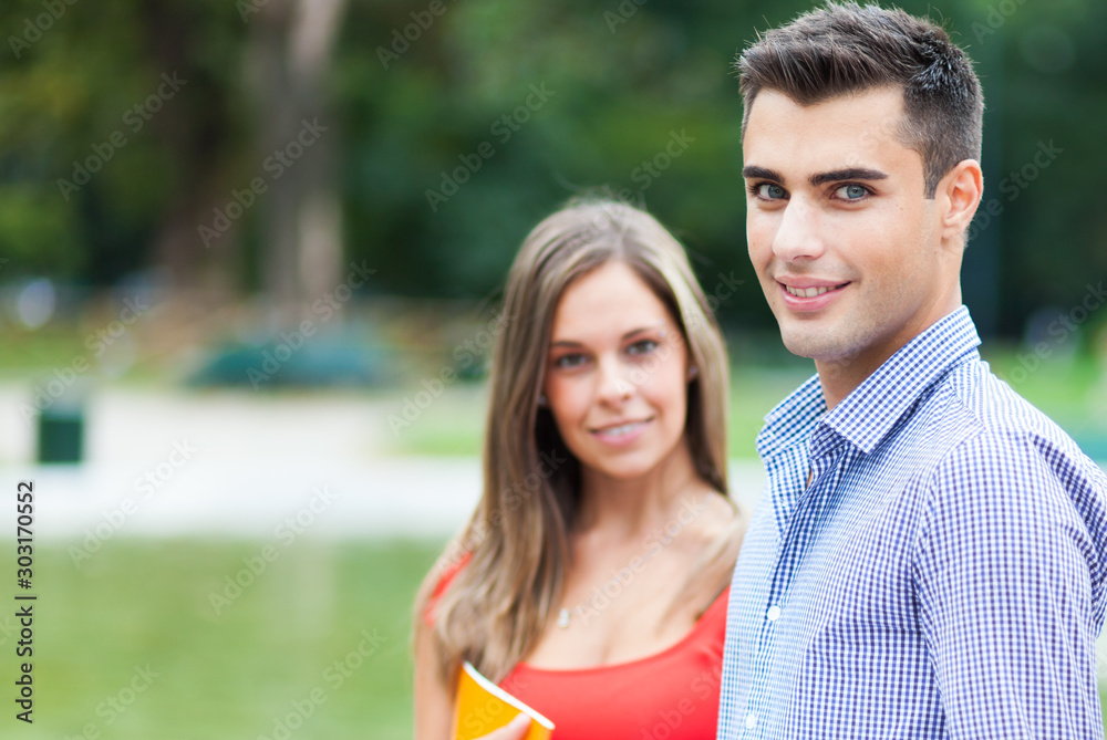 Fototapeta premium Happy students outdoor smiling confidently