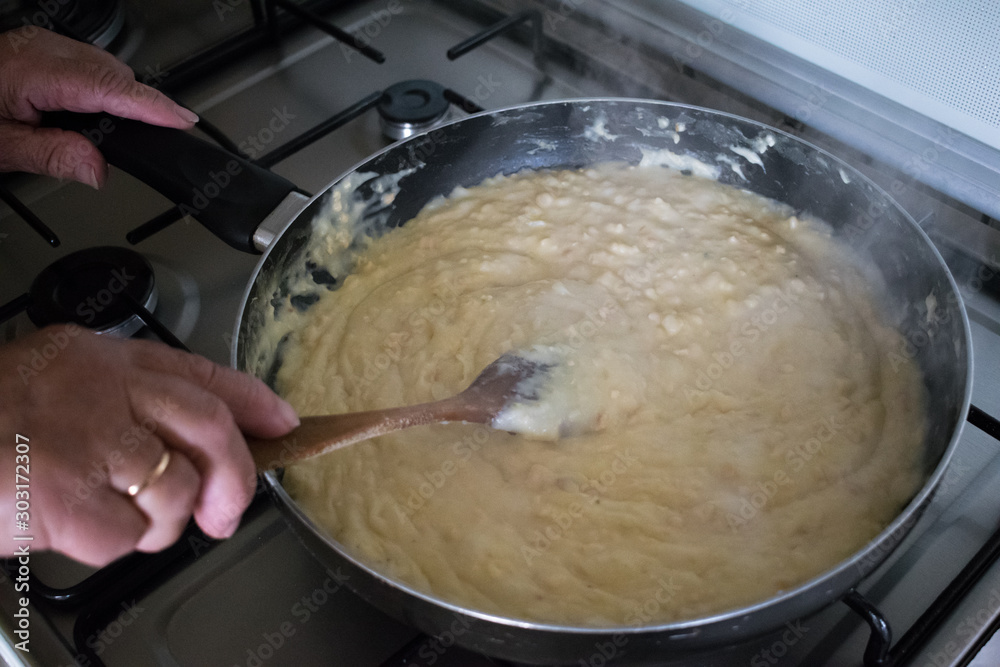 chef making homemade croquettes dough in the pan chef making homemade croquettes dough in the pan