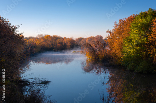 autumn landscape by the river in the morning © EvgenyPyatkov