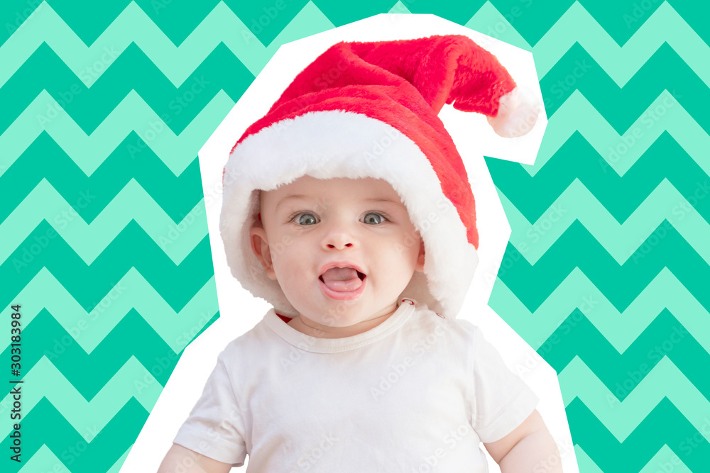 Magazine collage paper cut style portrait of a baby boy wearing a red Santa hat on a biscay green mint chevron background - fun Christmas card Magazine collage paper cut style portrait of a baby boy wearing a red Santa hat on a biscay green mint chevron background - fun Christmas card