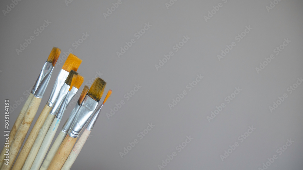 Various paint brushes on the empty background. Various paint brushes on the empty background.
