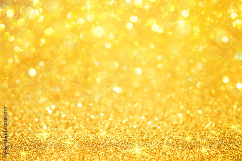 Luxury gold glitter with bokeh background, de-focused.