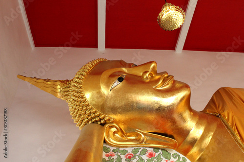 A beautiful Reclining Golden Buddha Statue Thailand