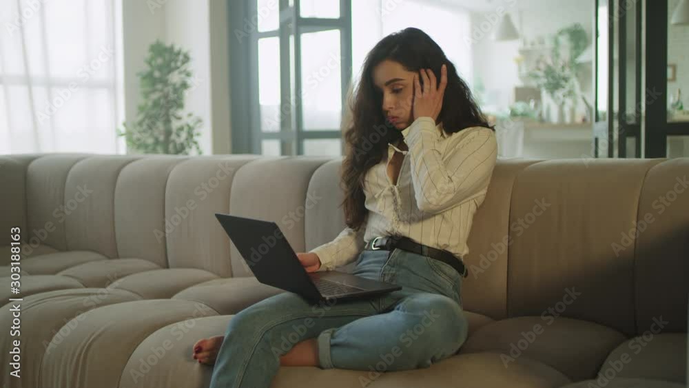 Portrait of sad freelancer girl looking laptop in slow motion. Tired woman. Portrait of sad freelancer girl looking laptop in slow motion. Tired woman.