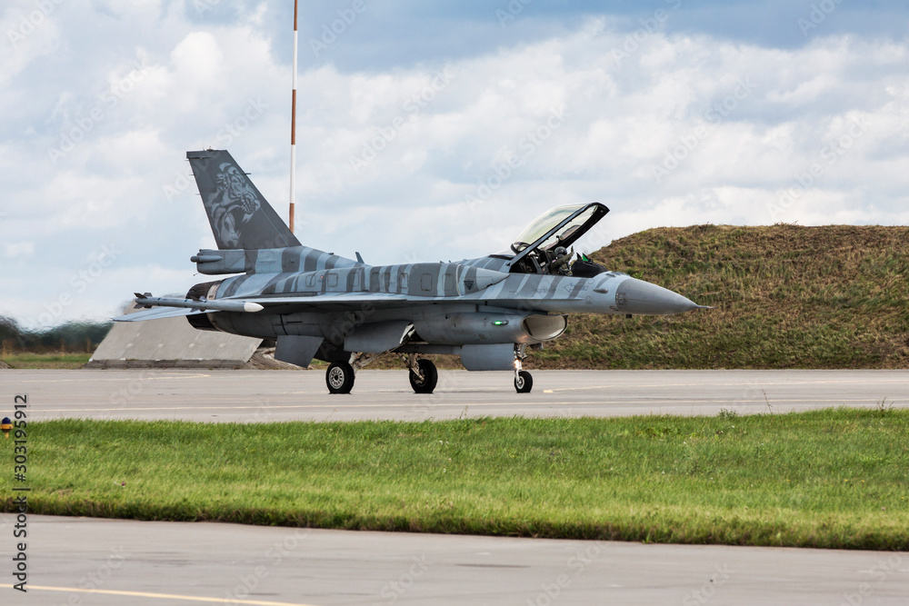 Modern American jet military aircraft before the start of a combat flight