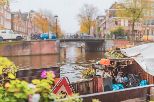 Junk on a boat on a canal in Amsterdam