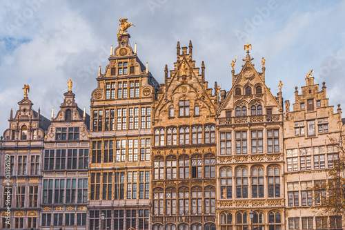 Gabled golden facades of house row in Antwerp