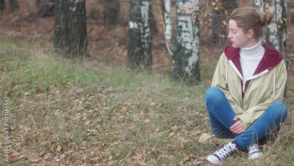 beautiful young blonde on a blurry background of autumn beautiful young blonde on a blurry background of autumn