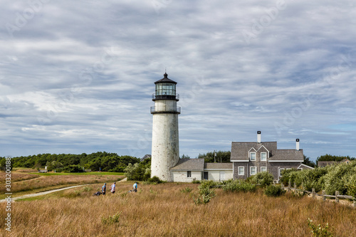 Highland Lighthouse  Cape Cod National Seashore  North Truro  Massachusetts with golfers in foreground. 