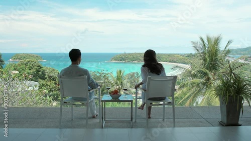 Wallpaper Mural Happy young couple drinking wine on balcony,4K Torontodigital.ca