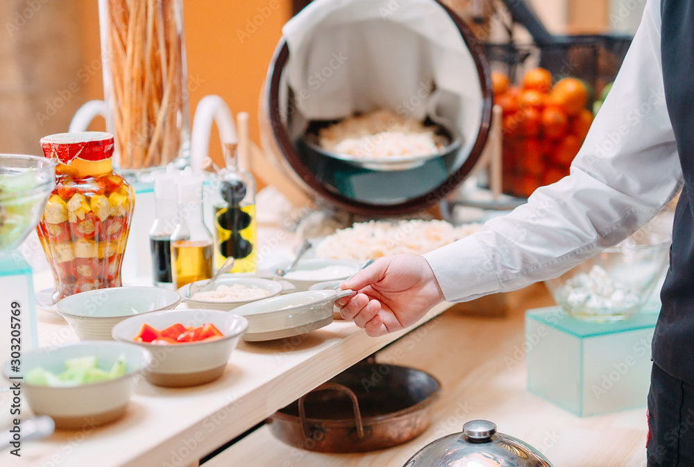 Breakfast buffet at the hotel or restaurant. Breakfast buffet at the hotel or restaurant.