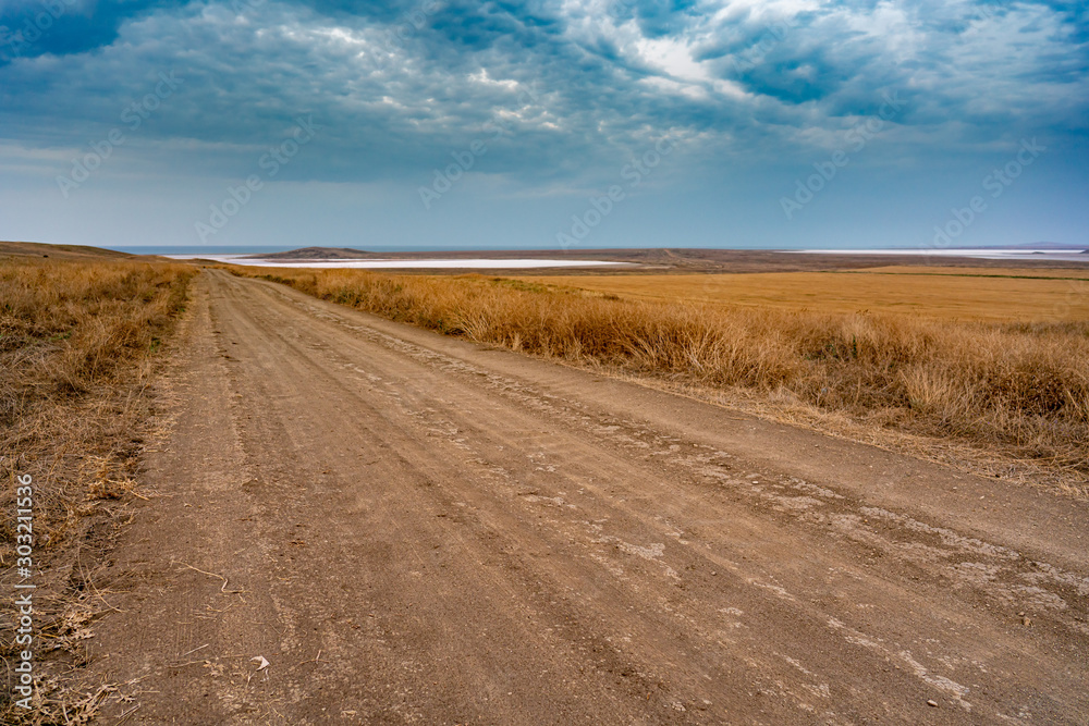Road to the Salt Lake in Valley in Crimea, Travel during Summer Road to the Salt Lake in Valley in Crimea, Travel during Summer