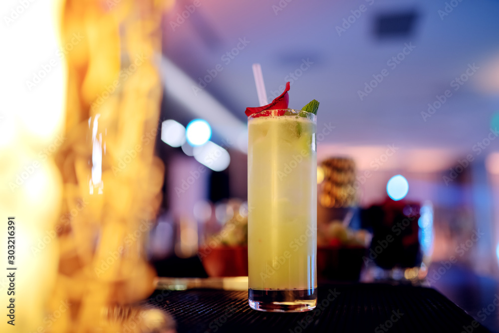 Fototapeta Picture of refreshing cocktail on bar.