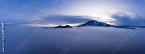 Jochberg, Kienstein und Sonnenspitz überm Nebelmeer photo