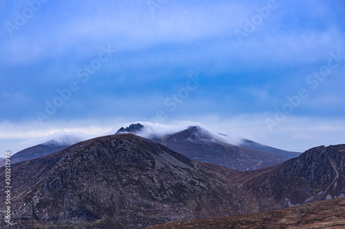 Low clouds forming over the Two Tors on Slieve Bearnagh, Mourne mountains, County Down, Northern Ireland