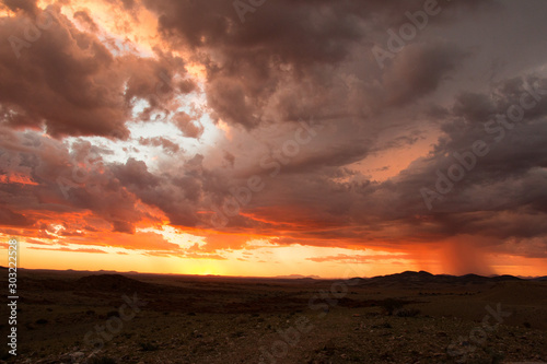 sunset over the desert of Namibia Solitaire 