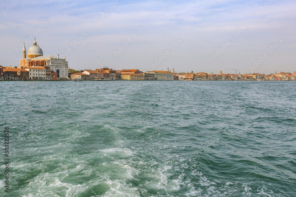 The colorful landscape of a historic city on the water. Venice, Italy