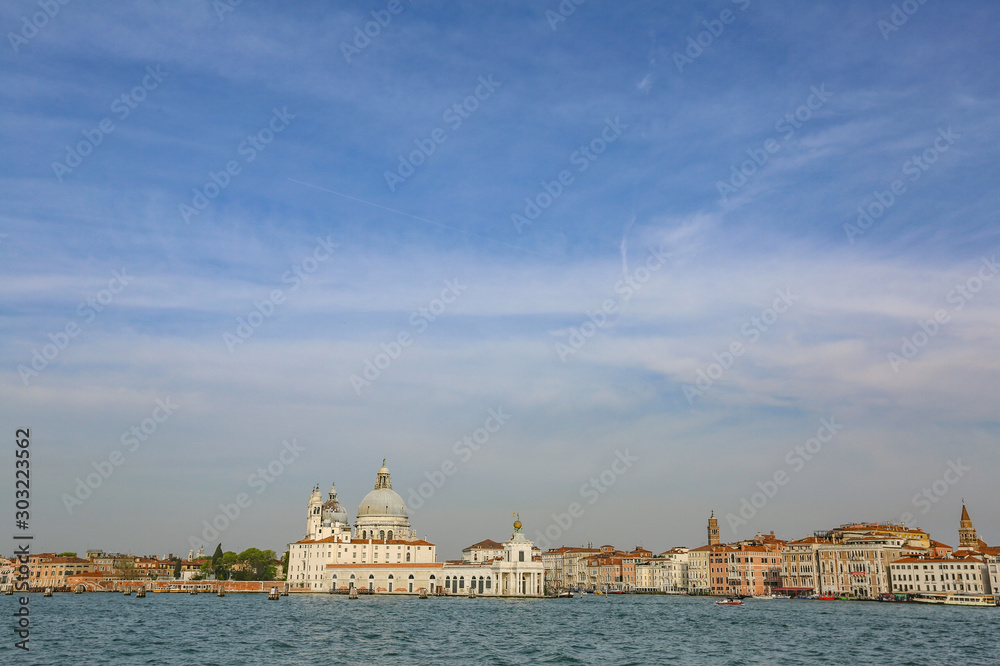 Fototapeta premium The colorful landscape of a historic city on the water. Venice, Italy