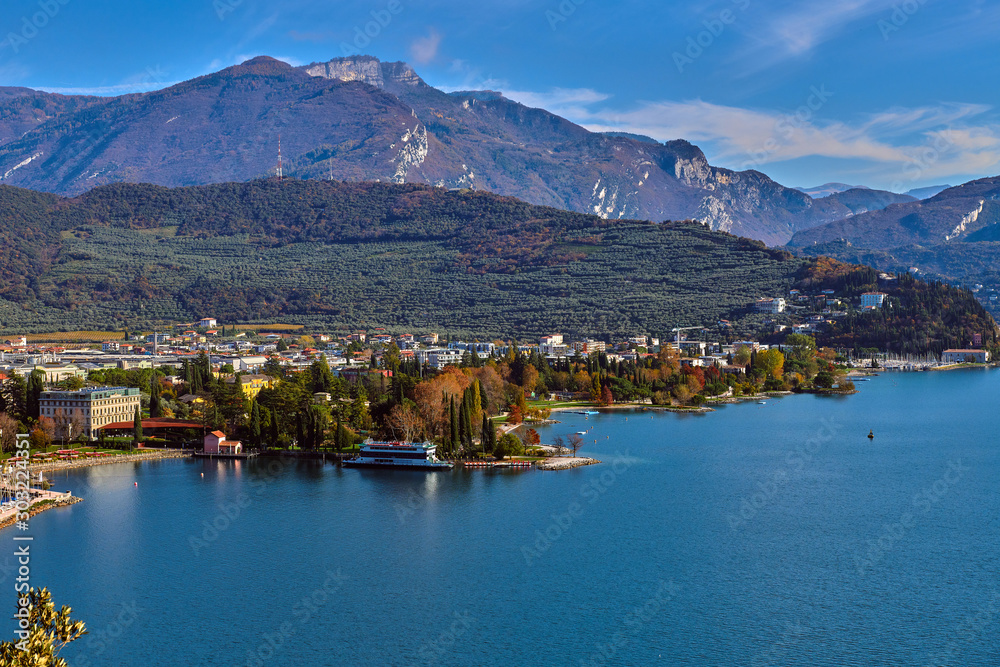 View of the beautiful Lake Garda surrounded by mountains,Riva del Garda town and Garda lake in the autumn time,Trentino Alto Adige region