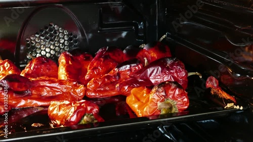red pepper in the oven to barbecue, red peppers are baking,
