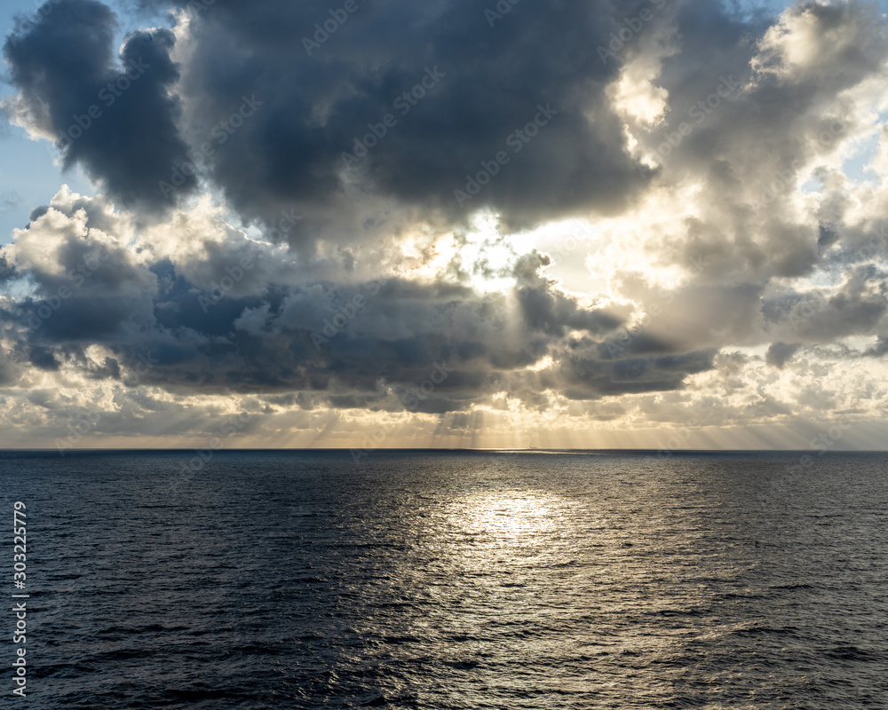 sunset on the sea with beautiful cloud patterns