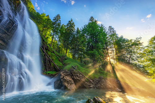Panoramic beautiful deep forest waterfall - long exposure concept