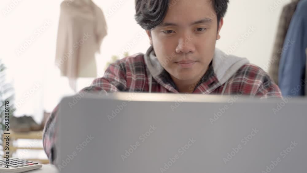 small online store business owner working from home. entrepreneur young asian man small online store business owner working from home. entrepreneur young asian man