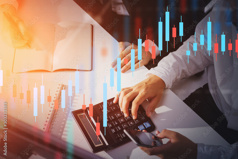 Hands of business people in office, forex graph Hands of business people in office, forex graph