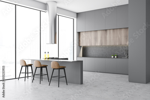 Panoramic gray kitchen corner with bar