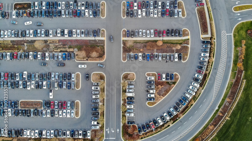 An aerial view of cars in a large parking lot during the holiday season photo