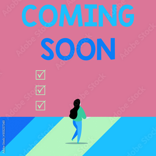 Word writing text Coming Soon. Business photo showcasing something is going to happen soon or after a short time Back view young long hair woman holding big blank square announcement
