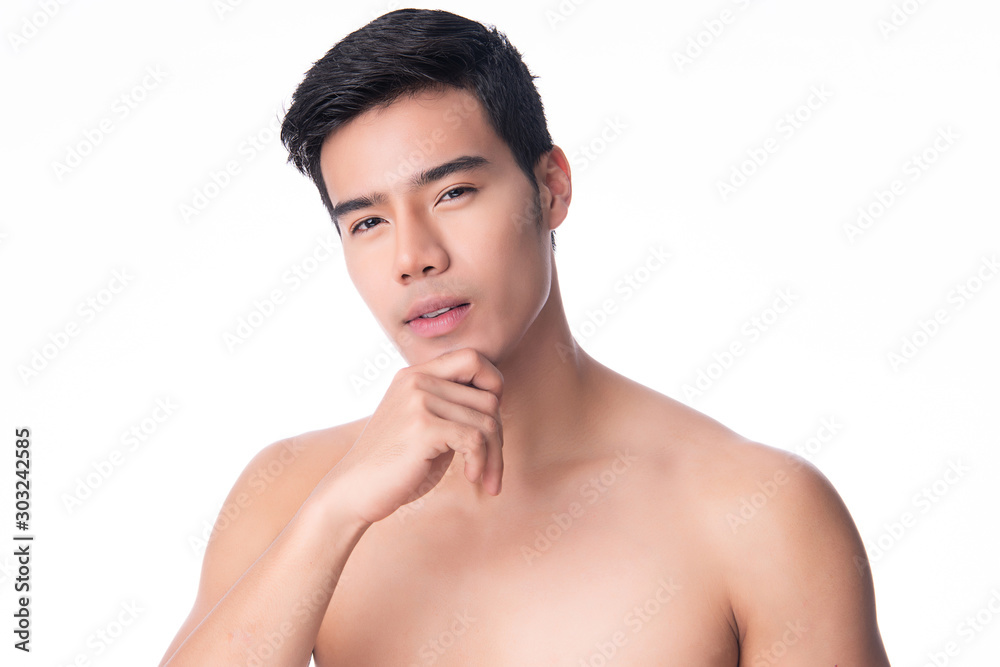 Portrait of Handsome young asian man on white background. Concept of men's health and beauty, self-care, body and skin care