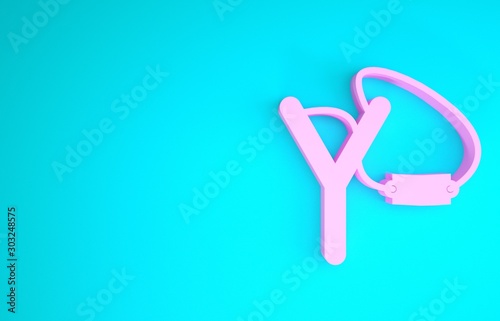 Valokuva Pink Slingshot icon isolated on blue background