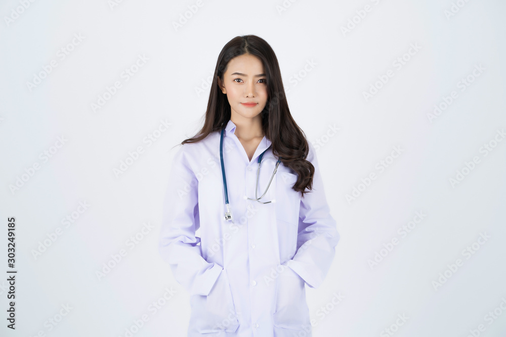 Doctor wearing white gown with a stethoscope on her neck. Doctor wearing white gown with a stethoscope on her neck.