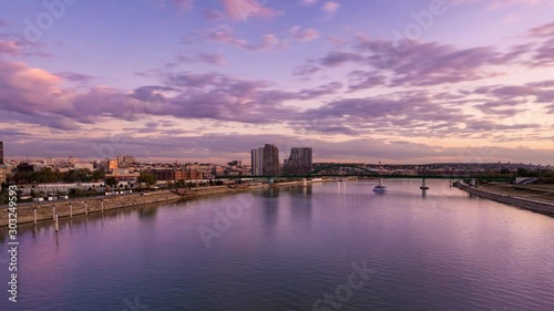 Day to night timelapse of Belgrade waterfront and Old railway bridge photo