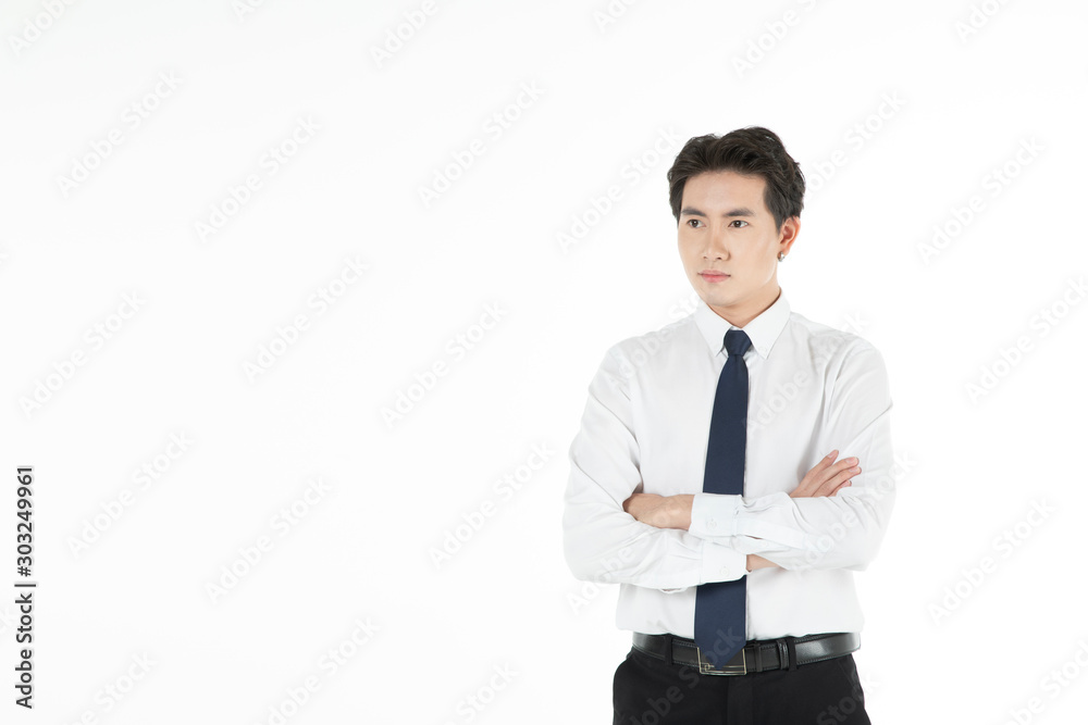 Portrait of asian man smiles and folds his arms looking to the left with copy space, isolated on white background. For motivation, finance, business, achievement, power and entrepreneur concept. Portrait of asian man smiles and folds his arms looking to the left with copy space, isolated on white background. For motivation, finance, business, achievement, power and entrepreneur concept.