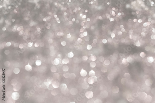 Abstract white bokeh background with glisters for new year and christmas concept