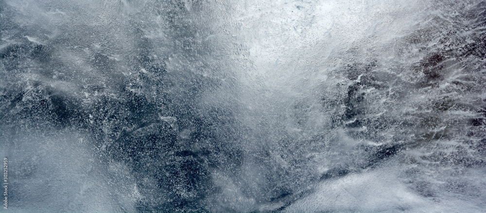 Abstract frozen water.Ice texture winter background - obrazy, fototapety, plakaty 
