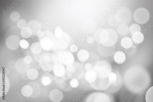 Black gray gradient abstract background blurred. white bokeh light beautiful shiny. use wallpaper backdrop and your product.