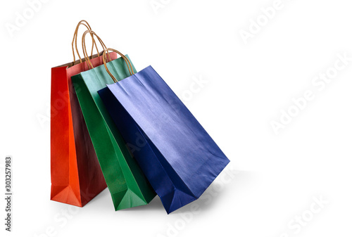 Group of colorful paper shopping bags isolated on white background