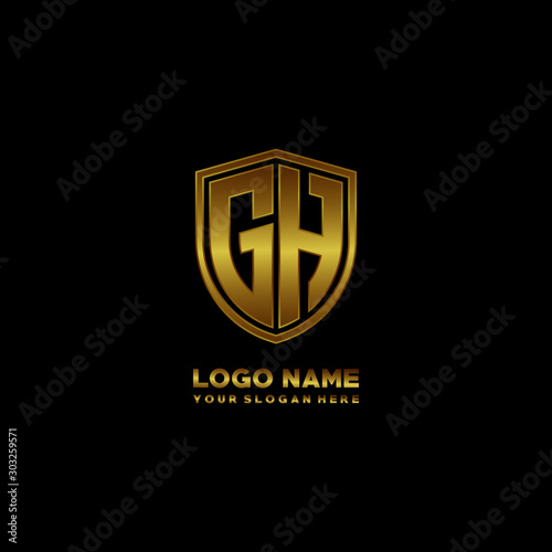 Initial letters GH shield shape gold monogram logo. Shield Secure Safe logo design inspiration