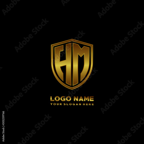 Initial letters HM shield shape gold monogram logo. Shield Secure Safe logo design inspiration