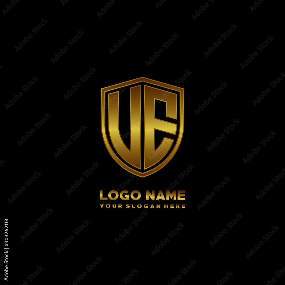 Initial letters UE VE shield shape gold monogram logo. Shield Secure Safe logo design inspiration Initial letters UE VE shield shape gold monogram logo. Shield Secure Safe logo design inspiration