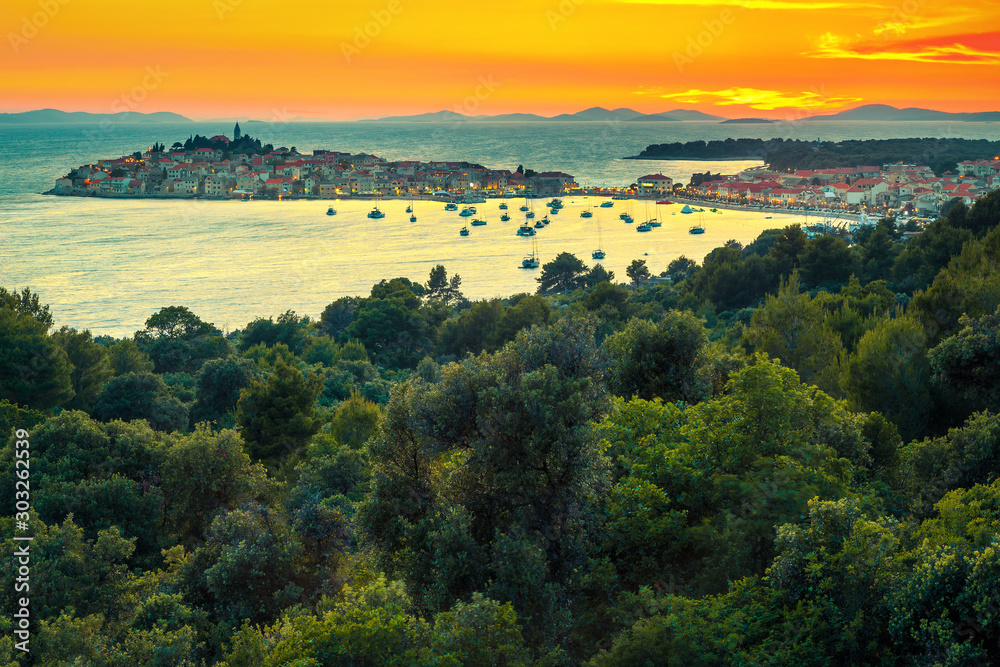 Primosten medieval town on the peninsula at sunset, Dalmatia, Croatia Primosten medieval town on the peninsula at sunset, Dalmatia, Croatia