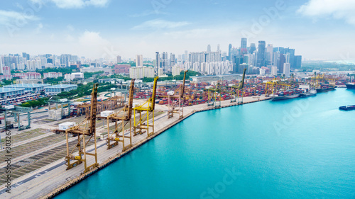 Drone view of cranes, cargo and containers © Creativa Images